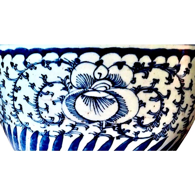 On offer is a late 19th-century or early 20th-century cachepot or small jardinière designed in the classic Ming Style Blue...
