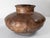 We are selling this great early Pre-Columbian pottery vessel. This vessel has squat squash form with red pottery body and...