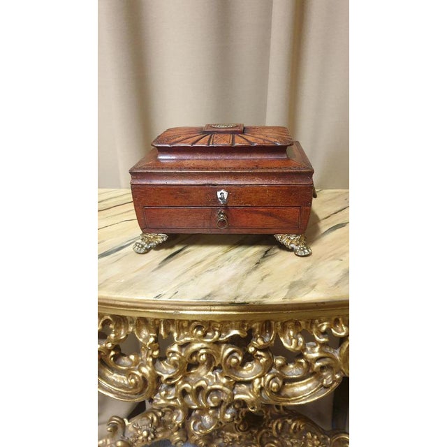 A very nice quality Regency red leather pagoda topped sewing box, with ormolu handles and feet, original lock, embossed...
