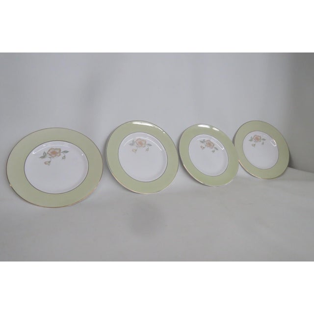 This darling Set of 4 Plates is made out of fine bone china. This lovely set presents Susie Cooper's "Wild Rose" (C987)...