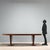 A generously sized executive table that can also be used as a dining table. It features a rectangular wooden top with an...