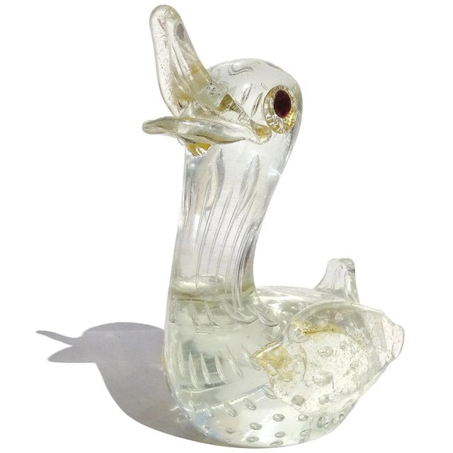 Beautiful vintage Murano hand blown clear, gold flecks, and bubbles Italian art glass baby bird figurine. Documented to...