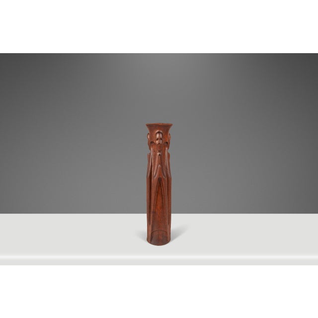 This hand-carved and turned solid teak sculpture shows exceptional artisan craftsmanship as well as exquisite old-growth...