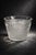 A substantial vintage pressed glass ice bucket or catchall bowl featuring a classic diamond hobstar pattern and scalloped...