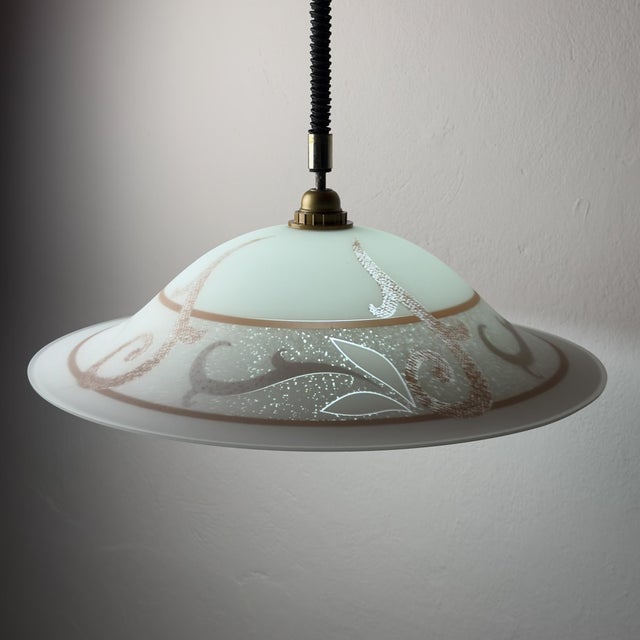 Vintage chandelier made in italy in the 1970s. there is a small chip. dimensions: width: 51 cm / 20 inches height: 22 cm /...