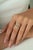 This bypass ring showcases 0.48 carats of natural aquamarine, set in 14K yellow gold. Each gemstone measuring...