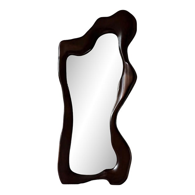 Make a dramatic statement with this luxurious sculptural full-length mirror, featuring a striking organic silhouette and a...