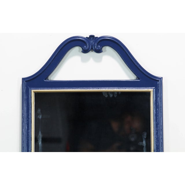 Mid Century blue mirror with gold painted accents and gloss finish Dimensions: 23" Width x 2"Depth x 47"Height See...