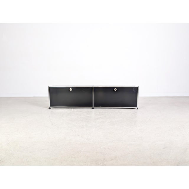 We are offering a beautiful usm haller lowboard in the highly sought-after black finish for sale. The unit features two...