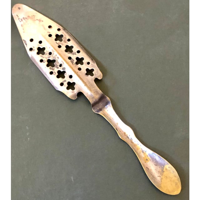 Silver plated French bar tool for absinthe drinks.