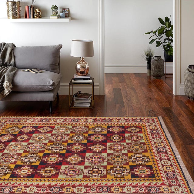 Experience the exceptional craftsmanship of this breathtaking Soumak rug, expertly created by skilled master weavers. Made...