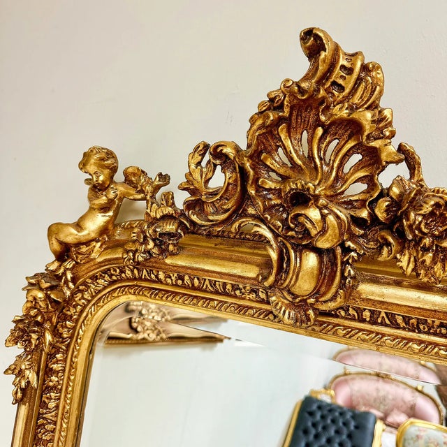 This French style gold floor mirror is a luxurious statement piece that showcases exquisite craftsmanship and elegant...