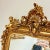 This French style gold floor mirror is a luxurious statement piece that showcases exquisite craftsmanship and elegant...