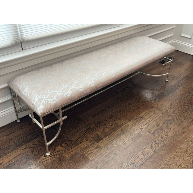 Hammered Champagne Silver Bench with Faux Snakeskin Upholstery Elegant and sculptural bench featuring a hand-hammered...