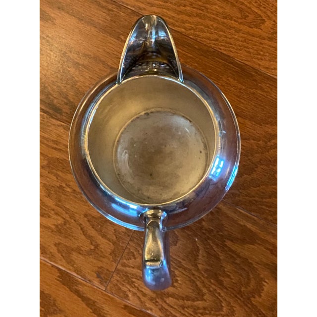 Mid 20th Century CREST Silver Mfg Corp Silver-Plated Water Pitcher - Holds 8 full cups of liquid. Hallmarked on bottom of...