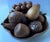 Elevate your tabletop with this exceptional mid-century modern hand-carved monkey pod wood fruit centerpiece set. Dating...