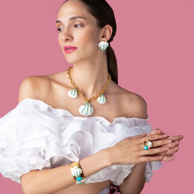 Introducing the Ayleen Studs, meticulously crafted from semi-precious stones. These studs feature a unique shell design...