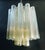 Vintage Italian chandelier with clear and yellow amber Murano glass tubes / made in Italy, circa 1960s in the style of...