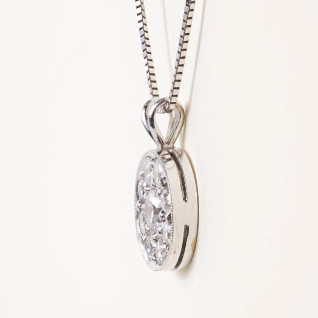 Late 20th Century 18k White Gold 1.25 Carat Diamond Cluster Circle Pendant Necklace For Sale In Los Angeles - Image 6 of 7