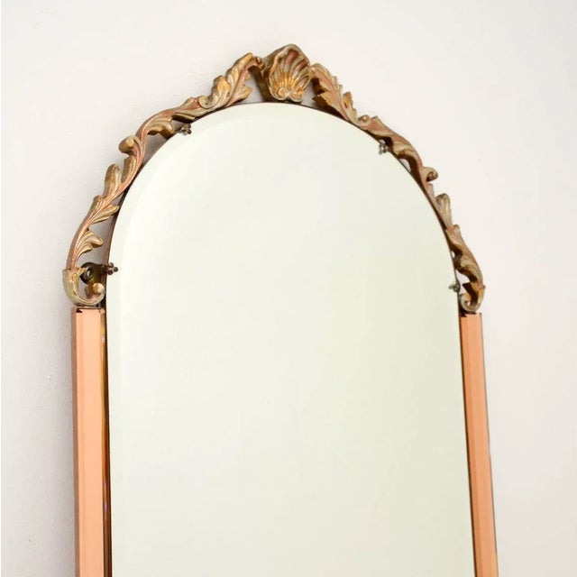 A beautiful and very interesting vintage art deco period decorative mirror, made from clear and peach bevelled glass. This...