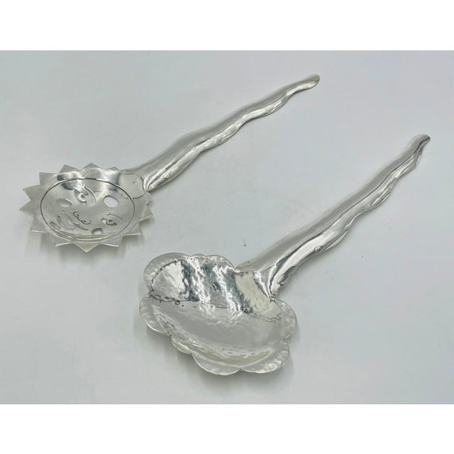Whimsical and highly collectible vintage serving utensil set designed and handcrafted in Taxco, Mexico by celebrated...