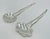 Whimsical and highly collectible vintage serving utensil set designed and handcrafted in Taxco, Mexico by celebrated...