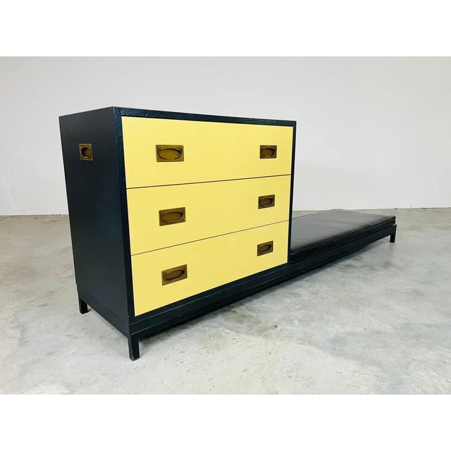 Striking Mid-Century Campaign 3-drawer chest with low bench having yellow drawer fronts with brass campaign style pulls,...