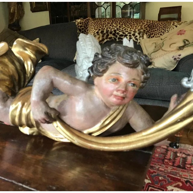 Baroque wooden (limewood) plychrome angel. 17th century, wondelfull condition and color golden parts perfect hook to hang...