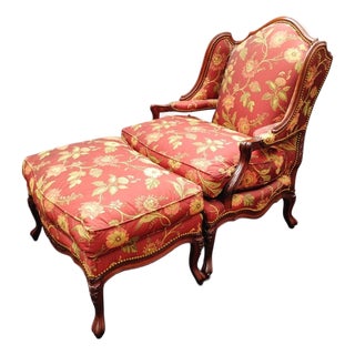 Experience the Peak of Traditional Elegance With This Custom French Country Bergère Chair and Ottoman by Taylor King. 1980s For Sale