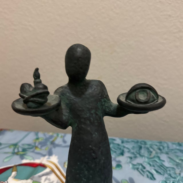 For sale is a striking contemporary bronze sculpture with a rich, dark verdigris patina. This piece features a minimalist,...