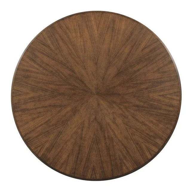 This table has a beautiful walnut top veneered in a sunburst pattern. The smooth curved legs provide both stability and...