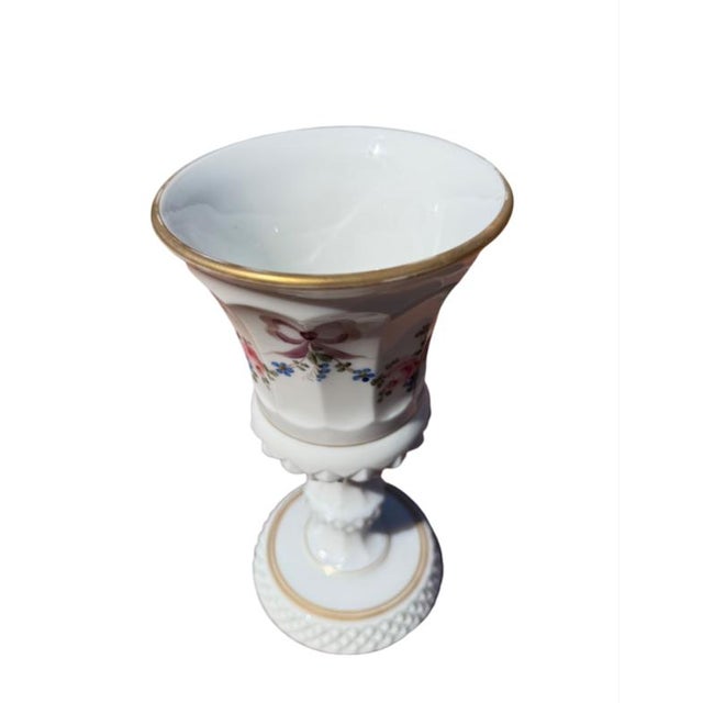 Here is the most feminine vessel from mid-century! It has gold bands and parts of it is cut glass.