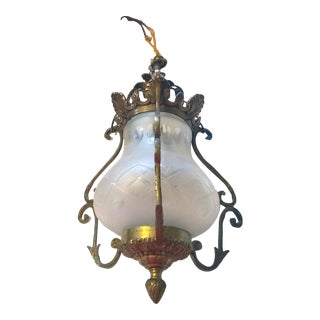 Early 20th Century French Victorian Brass Ceiling Lamp With Frosted Shade and Surrounding Brass Scrolls For Sale