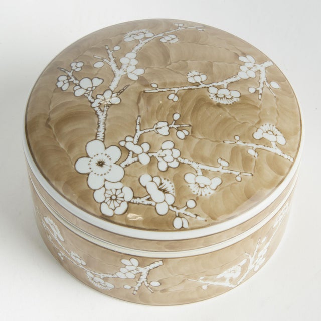 A classic chinoiserie pattern in taupe andWhite. In design, taupe is often associated with muted, sophisticated qualities....