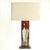 Ceramic table lamp features a rectangular body mounted on a dark wooden base with a motive of stylized vases glazed in...