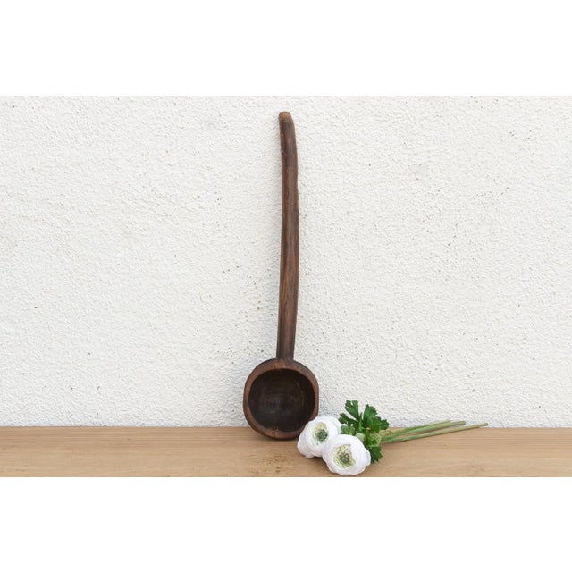There is something deeply soulful about a simple wooden spoon—especially one carved by hand to feed a village. This...