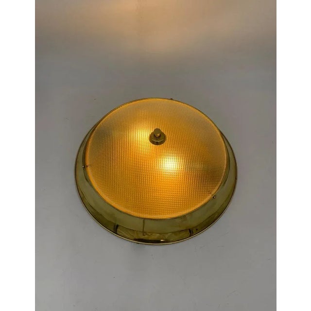 Fantastic ceiling light made in brass and a fantastic hand -worked glass on the mold, attributed to the company F.Arte...