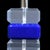A pair of blue and lucite table lamps, their compact cube-like forms glowing with color through clear acrylic. Petite at...