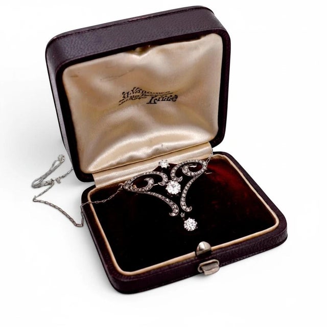 A testament to the grand romance and versatility of late 19th-century French high jewelry, this authentic Belle Époque...
