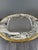 Elegant rectangular silver-plated serving tray with softened corners, resting on a finely crafted rim. The Louis XV-...