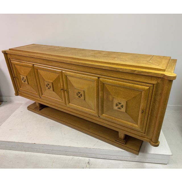 This sideboard is a stunning blend of Art Deco and Brutalist design elements from the 1930s to 1940s. It is crafted from...