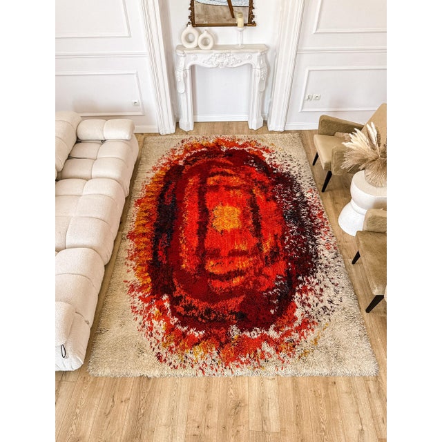 Known as "Płomień" (Flame), the design radiates outward from a molten yellow core through concentric bands of orange,...