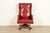 An exceptional Nordic Rustic European carved solid oak and leather high back executive swivel office desk chair By...