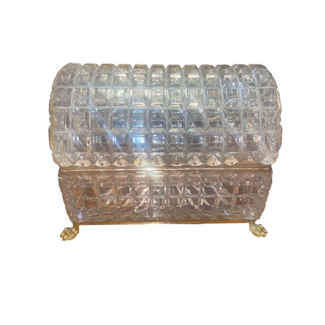 An exceptional and highly decorative set of three late 19th-century Baccarat crystal jewelry boxes, finely fashioned in...