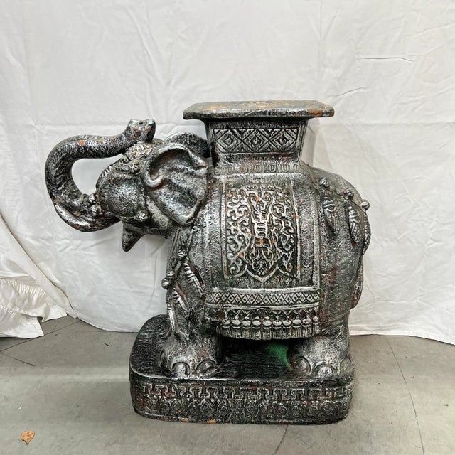 Vintage Chinoiserie elephant plant stand / drink table. Terra cotta mold with dark gray silver finish having red and green...