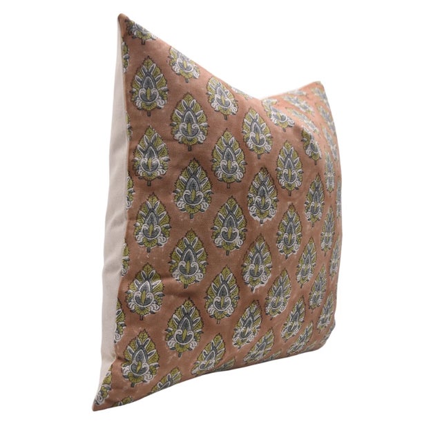 Add a touch of artisanal charm to your space with this beautifully handcrafted cushion cover. Featuring a traditional...