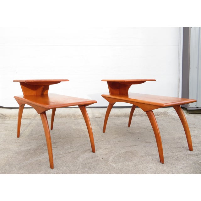 Nice mid century modern pair of Heywood Wakefield step side table pair in Champagne. Both tables cosmetically look nice...