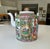 Chinese export canton famille rose porcelain lidded teapot from the 19th century (Qing Dynasty era). Featuring hand-...