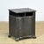 Bedside table from the 1930s with a characterful, industrial look. The cabinet features an elegant, curved front that...