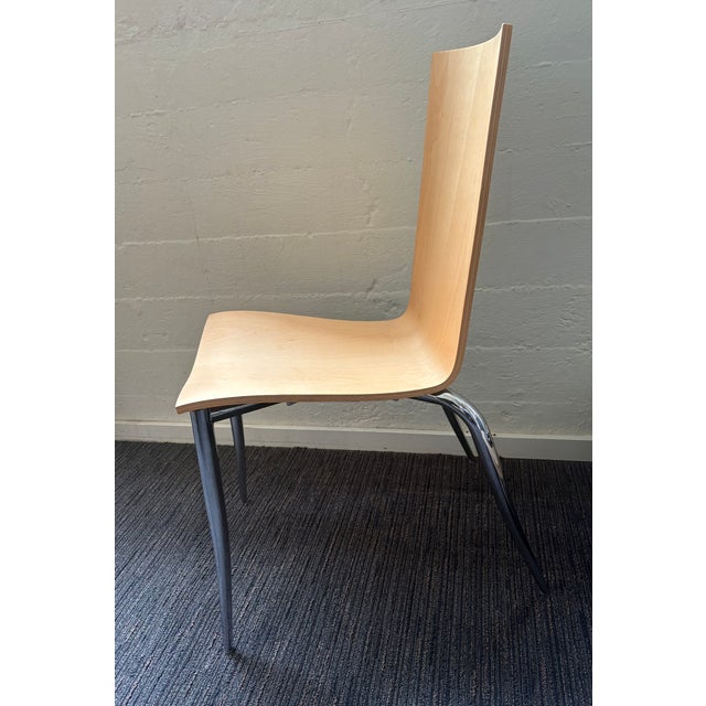 Philippe Starck's bent plywood Olly Tango chairs